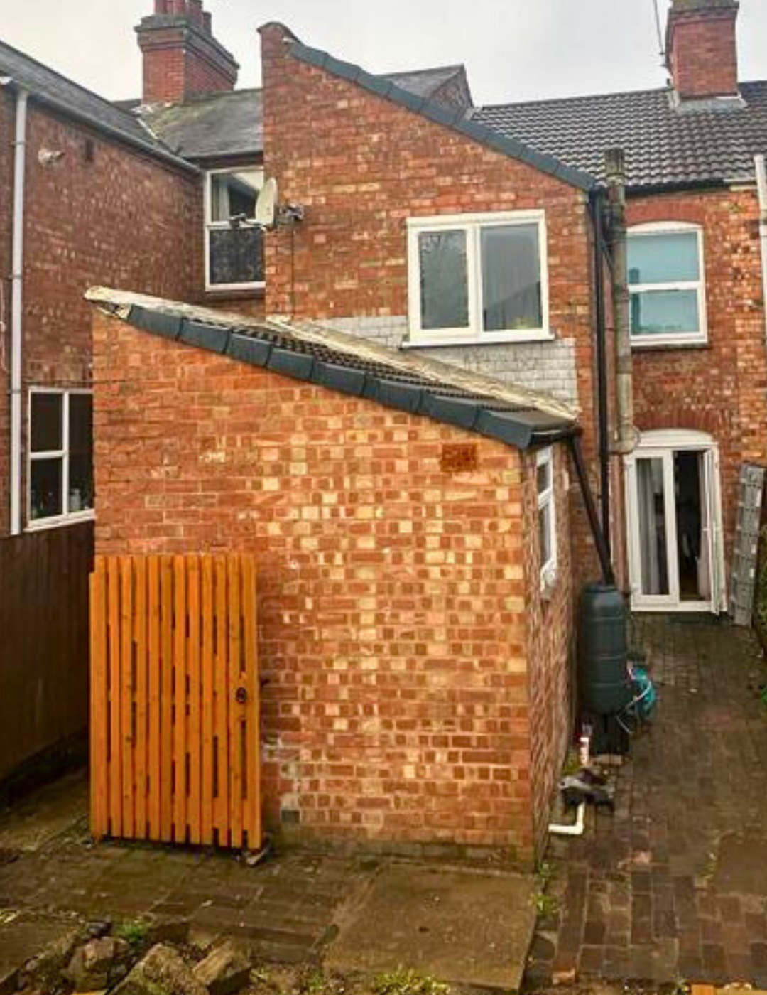 Old solid brick wall in Coventry before external wall insulation.