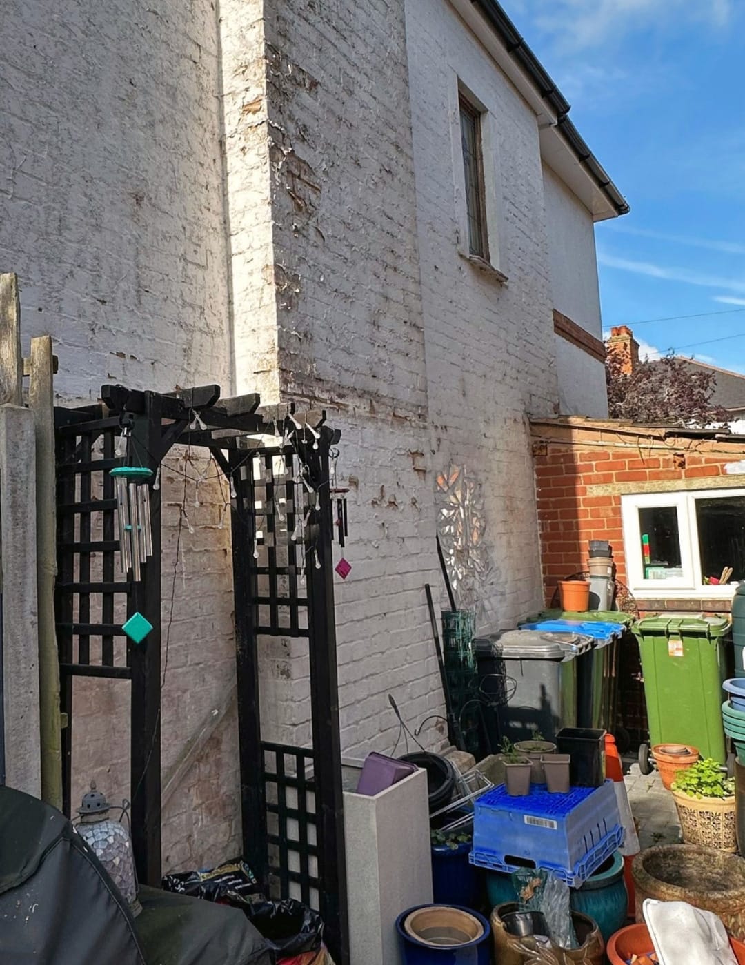 Old weathered facade in Nuneaton before silicone rendering upgrade.