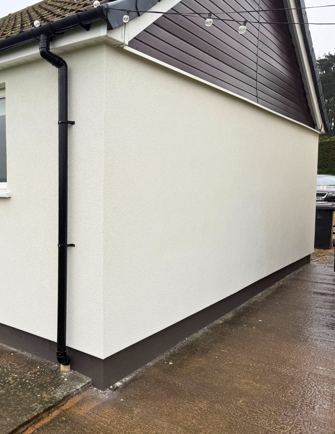 Pristine smooth white silicone render on a London property facade completed by PD Rendering.